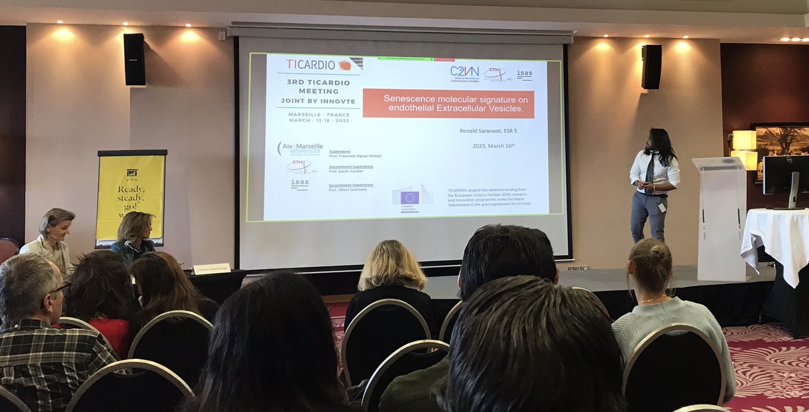 Ronald Saraswat giving an oral scientific presentation in Marseille